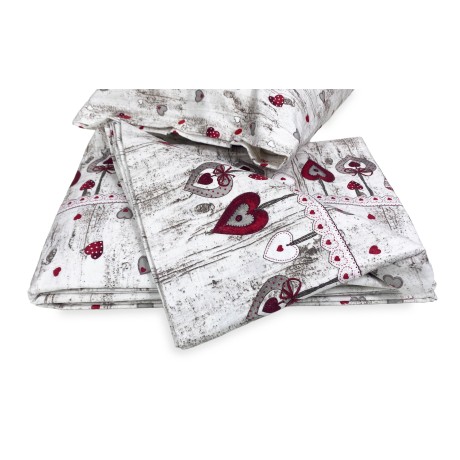 completo letto in flanellla stampato con cuori sul rosso