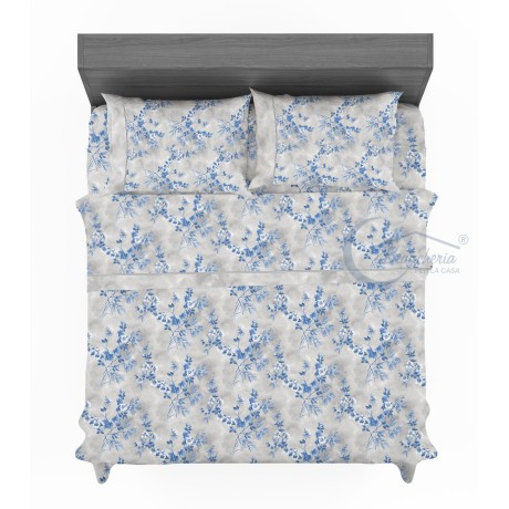 Drap en pur coton avec fleurs stylisées sur le bleu