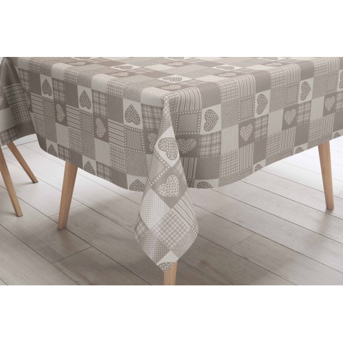 Mantel de hule hidrófugo con corazones sobre beige