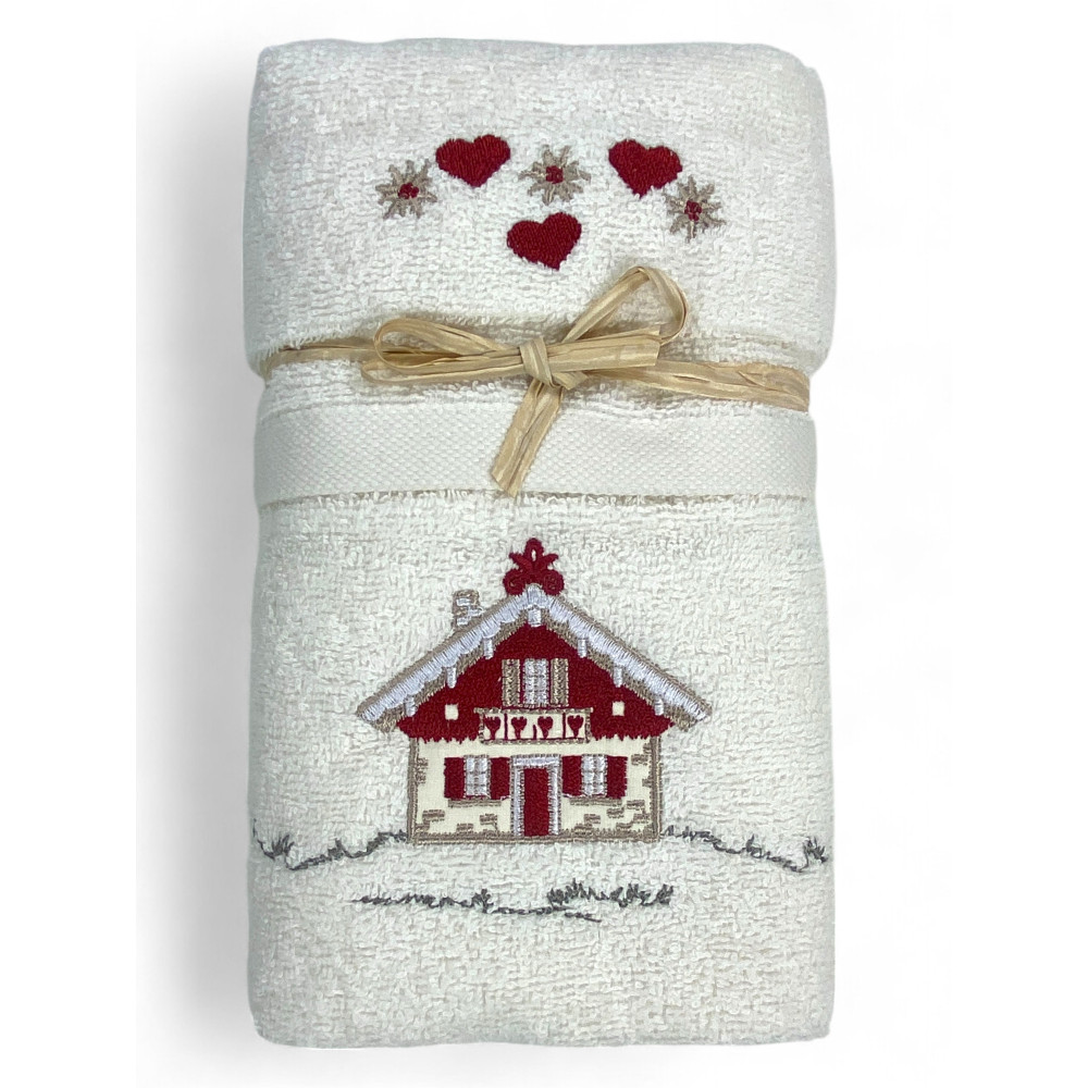 Cremefarbenes Tiroler Handtuchset mit Stickerei Alpenhaus aus 100% Baumwollfrottee Cremefarbenes Tiroler Handtuchset mit Stickerei Alpenhaus aus 100% Baumwollfrottee